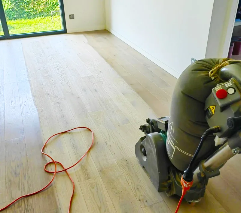 Ponçage à bande - entreprise de renovation parquet en Haute Savoie